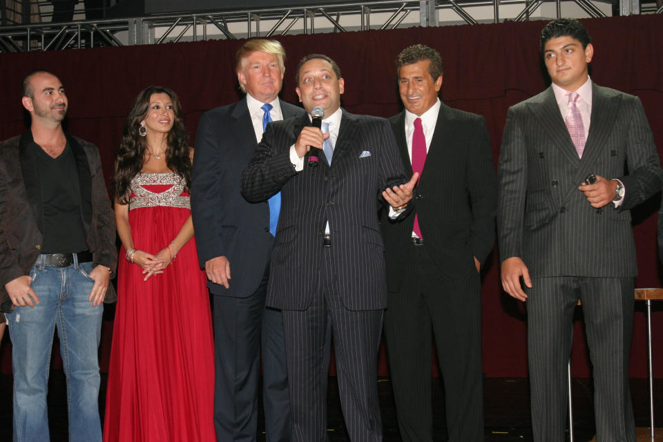 Felix Sater (center, holding the microphone) attends a launch party for the Trump Soho Hotel Condominium in Manhattan on Sept. 19, 2007. (Photo: Patrick McMullan via Getty Images)