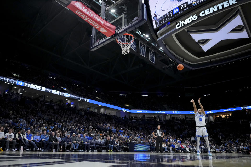 Xavier's guard Trey Green shoots a free throw after a technical foul on Uconn during the first half of an NCAA college basketball game Wednesday, Jan. 10, 2024, in Cincinnati. (AP Photo/Aaron Doster)