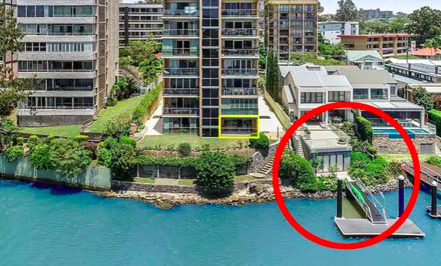 Brisbane real estate agency Ray White has been caught out appearing to Photoshop the Brisbane River in apartment photos.