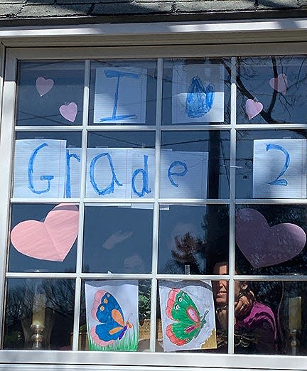 Hiawatha Elementary second graders in Mrs. Hultgren's class were challenged to create a special message to the community and hang on their window. The remote learning assignment was to provide encouragement during the COVID-19 pandemic in May 2020.