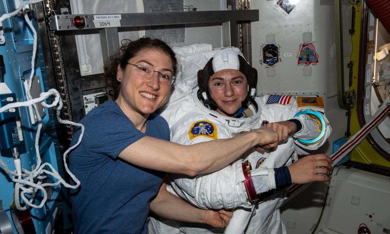 <span>Nasa astronauts Christina Koch (left) and Jessica Meir. Scientists say it is unclear why women might be more resilient to space flight</span><span>Photograph: Nasa Handout/EPA</span>