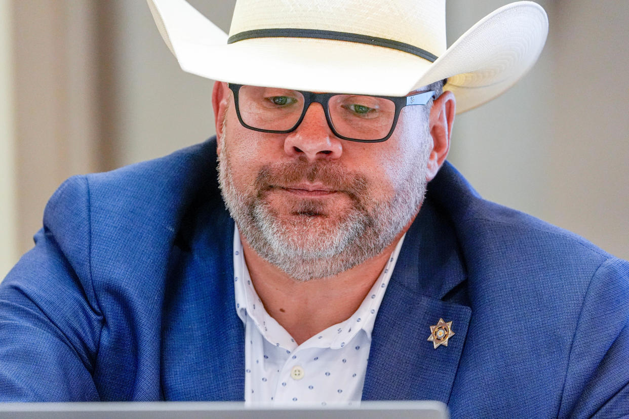 Sheriff Chris Amason presents a budget during a meeting at the Cleveland County Office Building in Norman, Okla., on Monday, June 17, 2024.