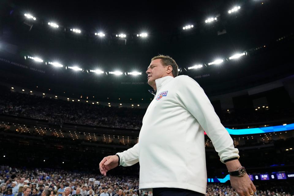 Kansas head coach Bill Self walks to the court for a college basketball game against Villanova in the semifinal round of the Men's Final Four of the NCAA tournament on April 2, 2022, in New Orleans.
