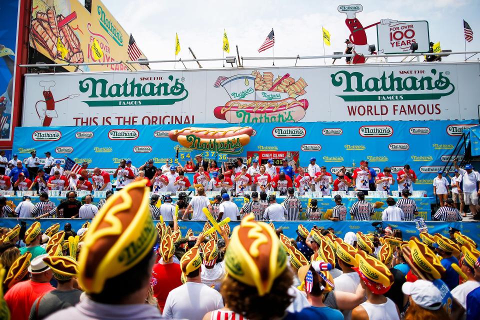 People compete during the annual Nathan's Hot Dog Eating Contest