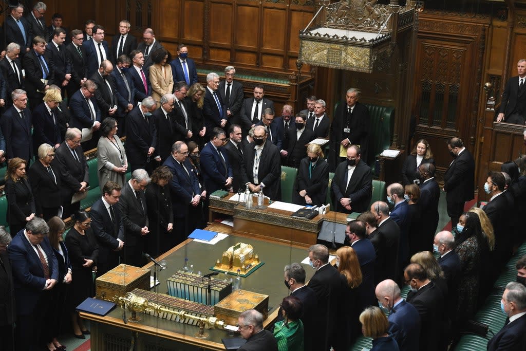 MPs pay tribute to Sir David Amess with a minute’s silence. Boris Johnson was missing from the front bench (via REUTERS)