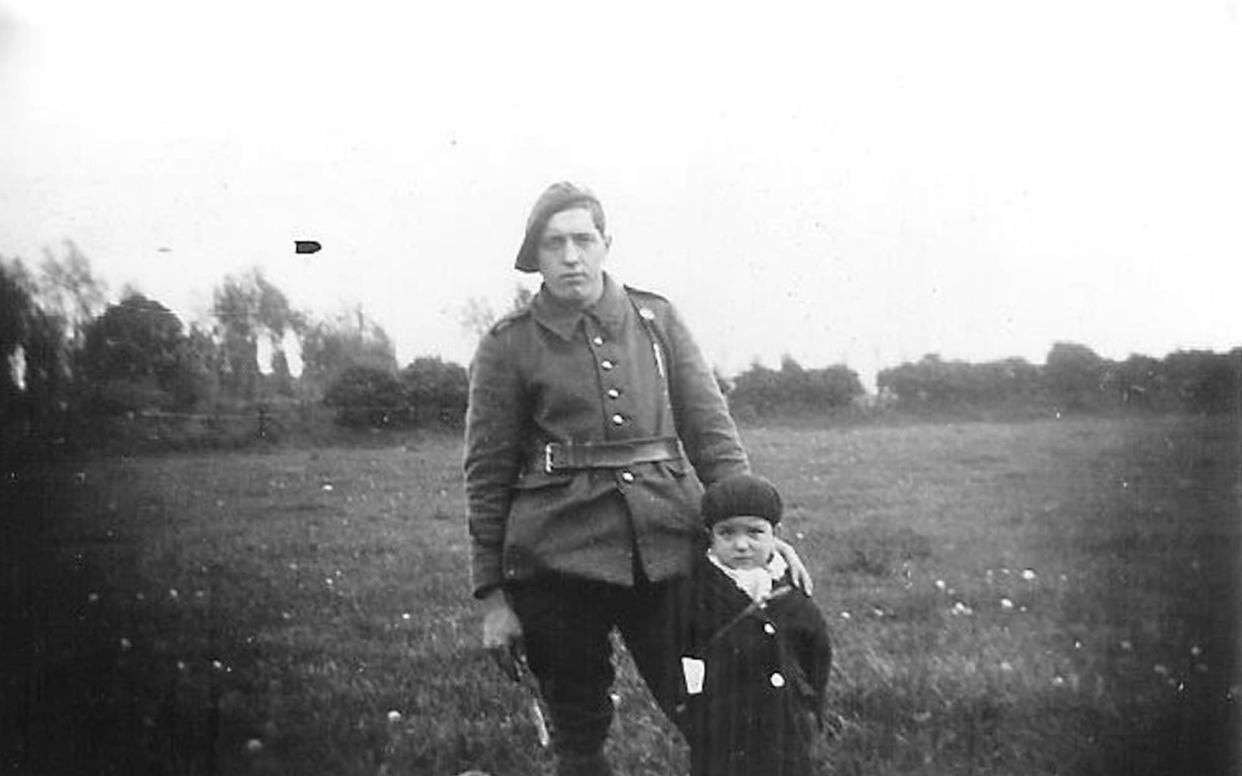 The youngest member of French wartime resistance Marcel Pinte (R) also known as "Quinquin" with an unidentified soldier -  AFP