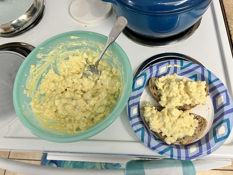 Homemade egg salad sandwich on multigrain bread.