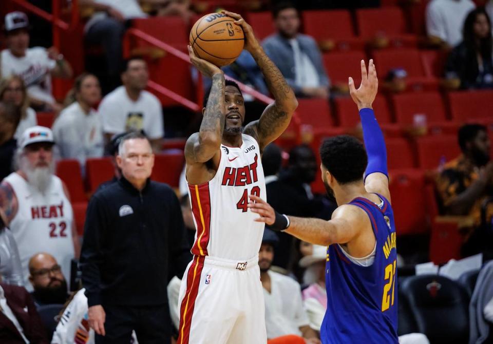 Miami Heat forward Udonis Haslem (40) shoots over Denver Nuggets guard Jamal Murray (27) during the second half of Game 3 of the NBA Finals at Kaseya Center on June 7, 2023, in Miami.