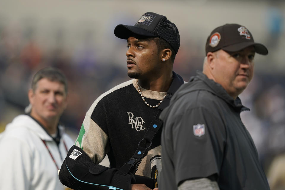 Cleveland Browns quarterback Deshaun Watson, center, looks on before an NFL football game against the Los Angeles Rams, Sunday, Dec. 3, 2023, in Inglewood, Calif. (AP Photo/Ryan Sun)