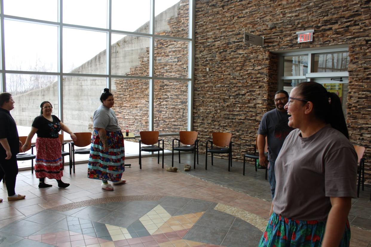 Participants learn the ko'jua in a workshop at Metepenagiag Heritage Park on Friday. (Oscar Baker III/CBC - image credit)