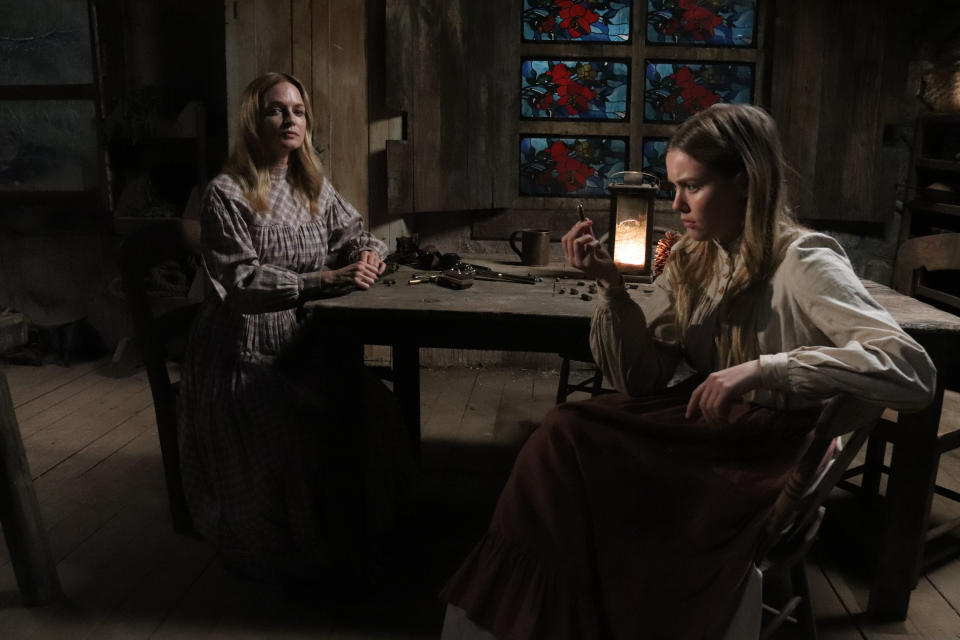 (LR) Heather Graham as Pandora and Brielle Robillard as Hester in the horror thriller PLACE OF BONES, a release from The Avenue (Photo courtesy of The Avenue)