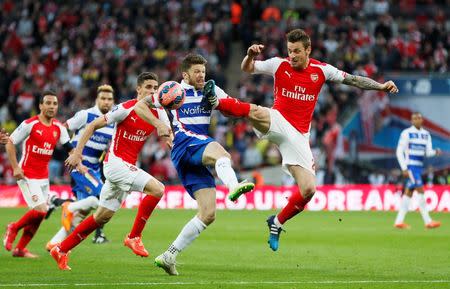 Football - Reading v Arsenal - FA Cup Semi Final - Wembley Stadium - 18/4/15 Reading's Jamie Mackie in action with Arsenal's Mathieu Debuchy Reuters / Stefan Wermuth Livepic