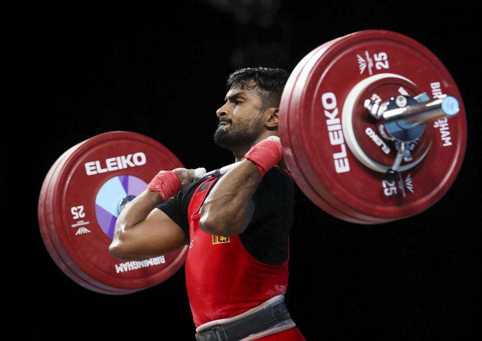 Sri Lanka's Arachchilage Jayasooriya during the Men's 67kg Final at The NEC on day three of the 2022 Commonwealth Games in Birmingham, Sunday July 31, 2022. (Isaac Parkin/PA via AP)