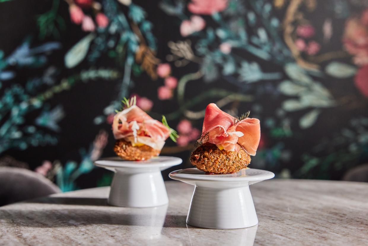 The food menu at high-end cocktail lounge Prelude will serve "fun canapés," like these sweet pea croquettes.