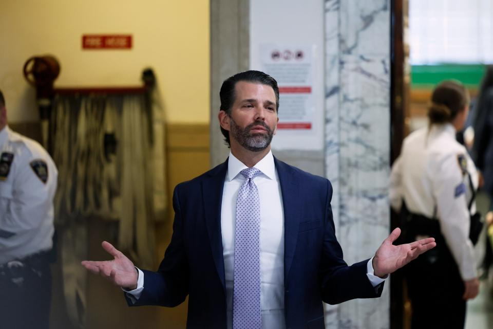 Donald Trump Jr. speaks as he leaves the courtroom after testifying in his civil fraud trial at New York State Supreme Court on Nov. 13, 2023 in New York City. Trump Jr. is the first witness called by the Trump defense team during the civil fraud trial concerning allegations that he, his brother Eric, and former President Donald Trump conspired to inflate Trump Sr.'s net worth on financial statements provided to banks and insurers to secure loans. New York Attorney General Letitia James has sued seeking $250 million in damages.