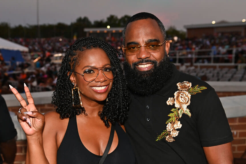 Kandi Burruss and Todd Tucker in a stadium venue for 2023 Atlanta Funk Fest.