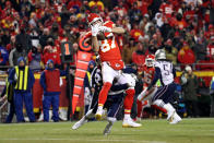 <p>Travis Kelce #87 of the Kansas City Chiefs catches a 12 yard touchdown pass in the third quarter against J.C. Jackson #27 of the New England Patriots during the AFC Championship Game at Arrowhead Stadium on January 20, 2019 in Kansas City, Missouri. (Photo by Patrick Smith/Getty Images) </p>