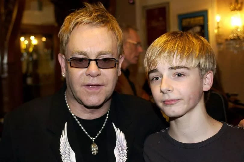 Sir Elton John with original Billy Elliot actor Liam Mower, following a performance of the musical at the Victoria Palace Theatre, London, in November 2006