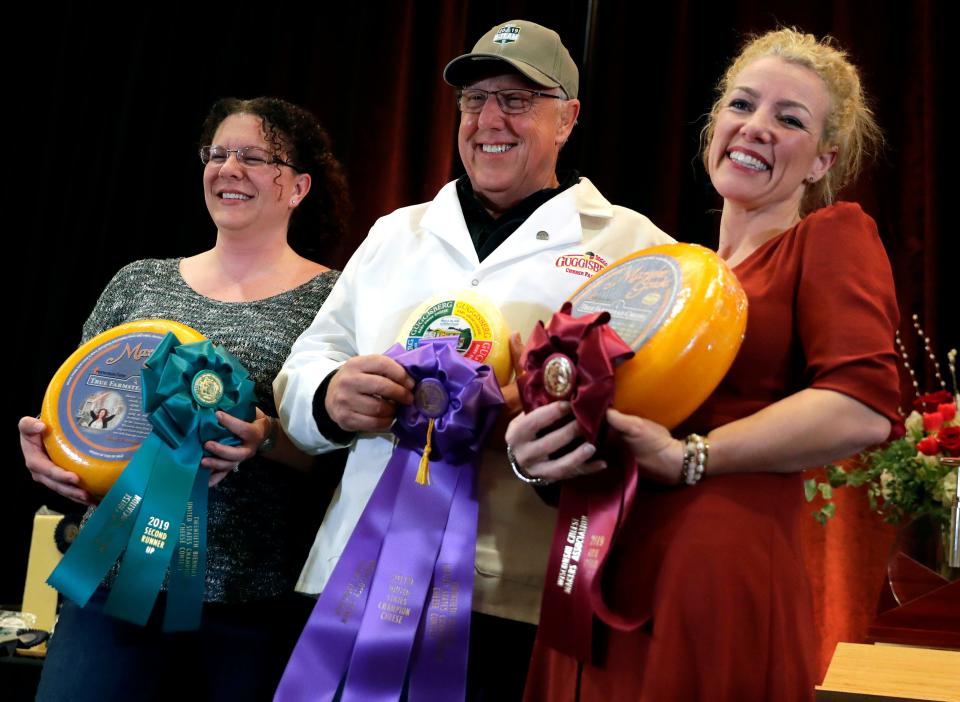 Marieke Penterman, (right) has won dozens of awards for her gouda, which is made with old-world Dutch processes. In this photo from 2019, she celebrates third place in a U.S. Championship Cheese Contest, held in Green Bay.