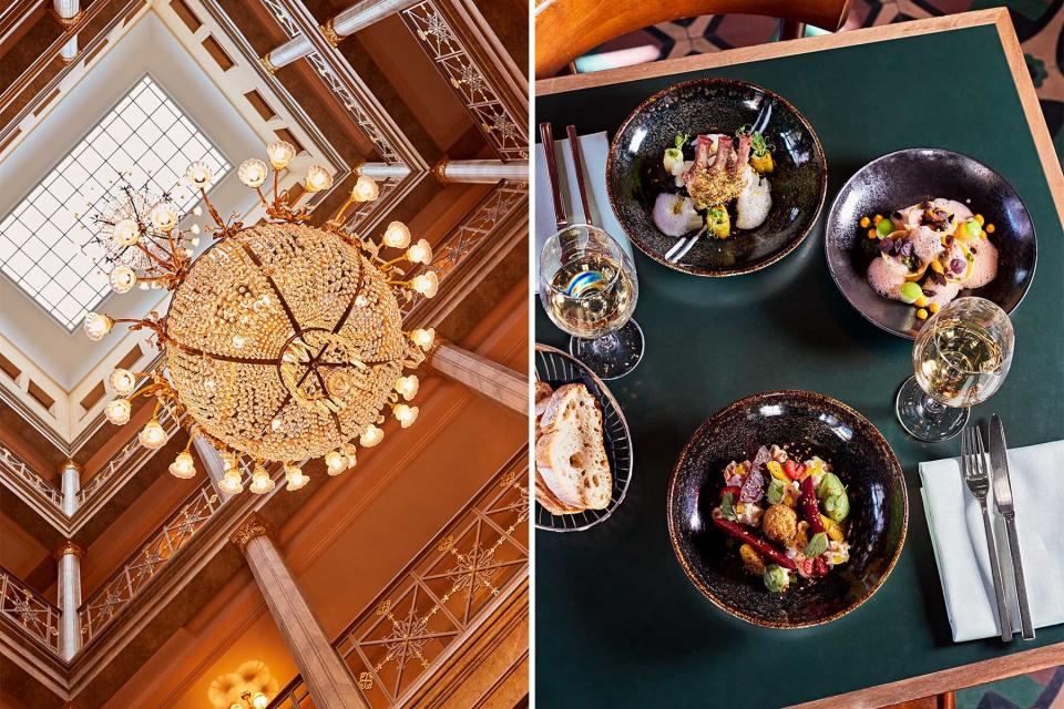 A chandelier hanging in a hotel lobby, and a spread of restaurant dishes on a green table, in Basel, Switzerland