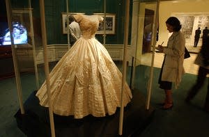 Exhibit at the JFK Library celebrtes the 50th anniversary of the wedding of Jacqueline Bouvier and John F. Kennedy.  Mrs. Kennedy's ivory-silk-taffeta wedding dress designed by Ann Lowe is a highlight.