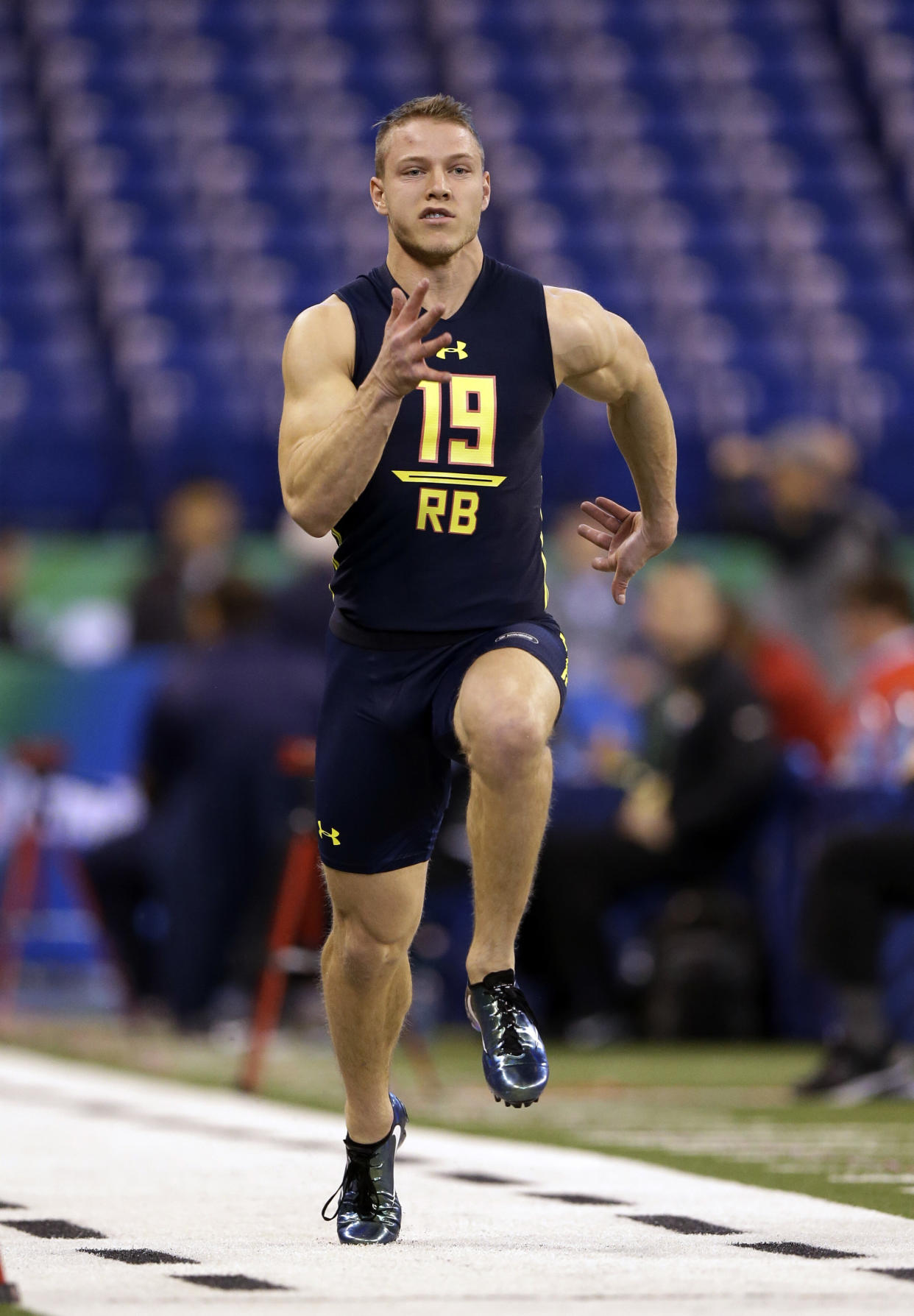 Stanford running back Christian McCaffrey runs the 40-yard dash at the NFL scouting combine in 2017. (AP)