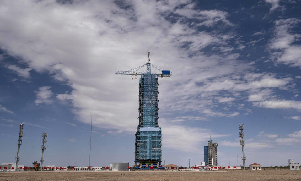 Image: The  launch platform housing the Shenzhou-12 spacecraft and Long March-2F rocket is seen at the Jiuquan Satellite Launch Center (Kevin Frayer / Getty Images)