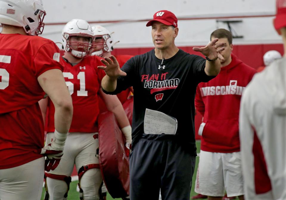 New UW offensive line coach Bob Bostad landed a commitment from an Arizona recruit.