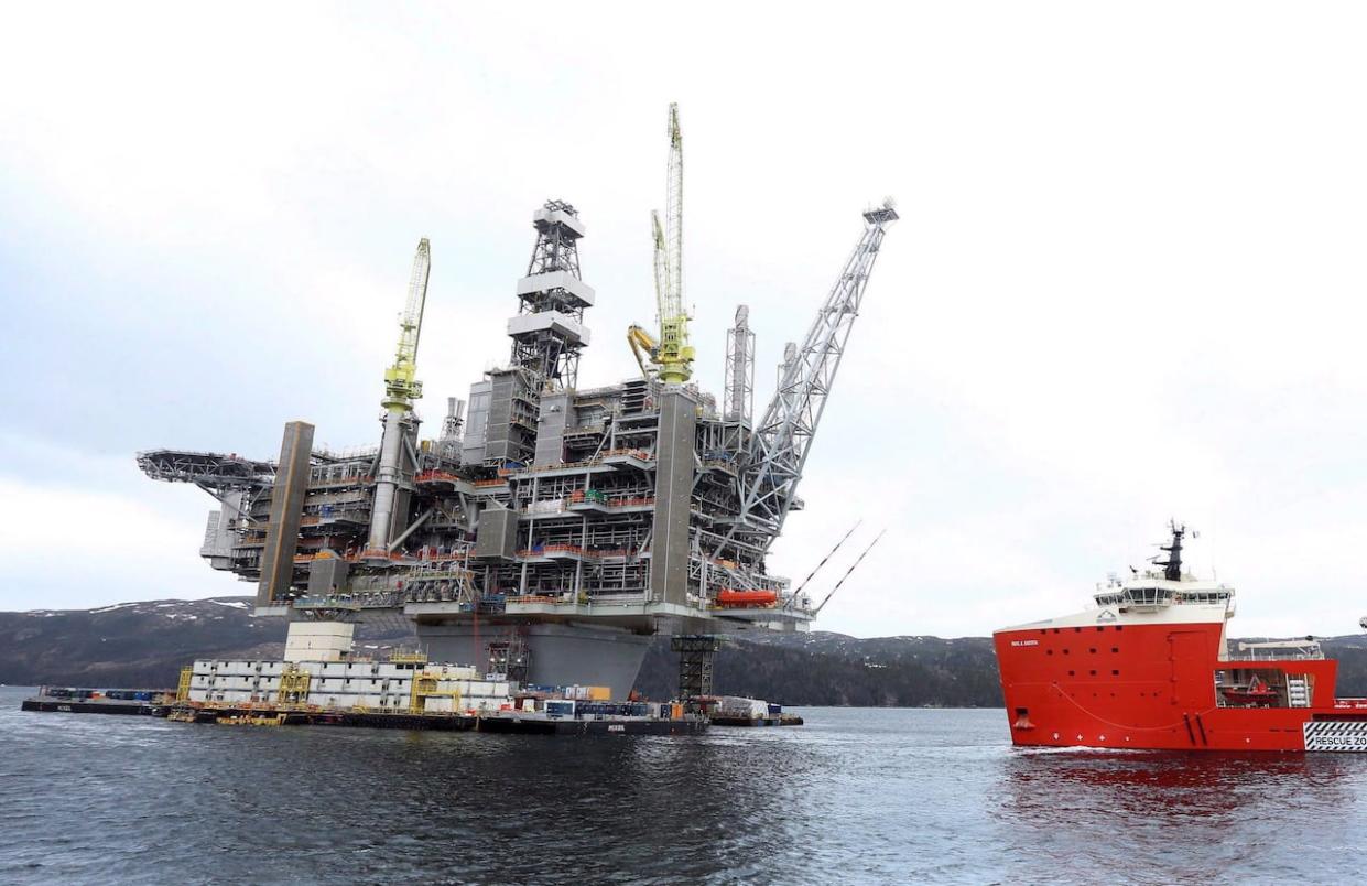 The Newfoundland and Labrador government is considering selling its stakes in the offshore oil industry, including a 4.9 per cent equity stake in the Hebron project. (Paul Daly/The Canadian Press - image credit)