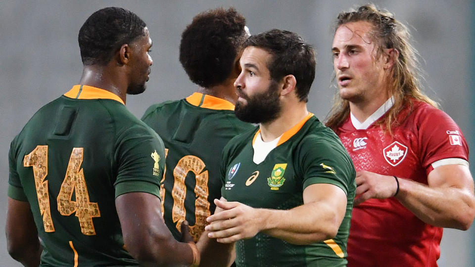 South Africa and Canada players, pictured here after their clash at the Rugby World Cup.