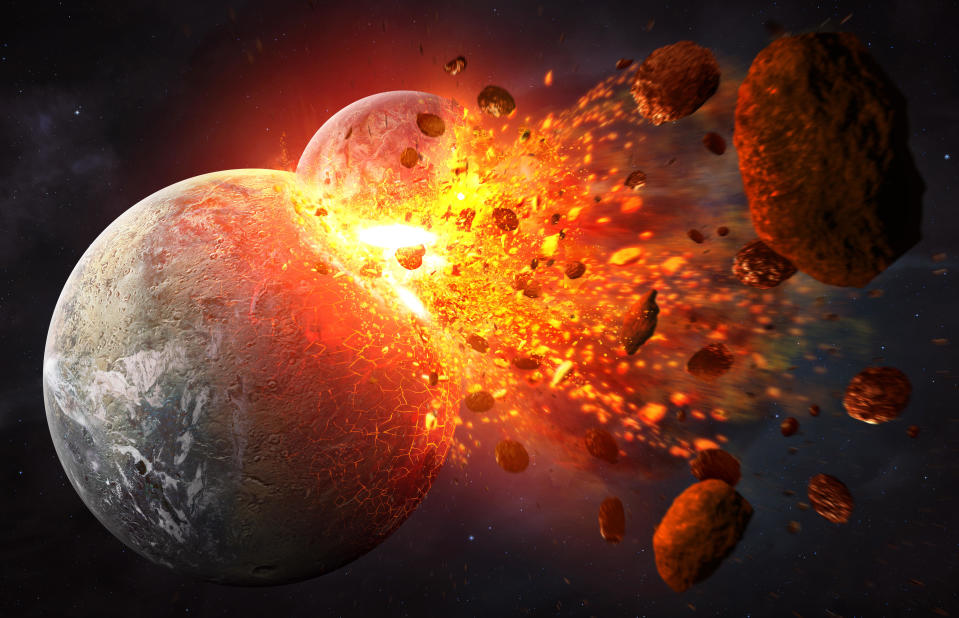 Illustration of the giant impact hypothesis, with the hypothetical planet Theia colliding with Earth 4.5 billion years ago, created on July 19, 2015. This impact is suggested to be the source of material that created the moon.  / Credit: Illustration by Tobias Roetsch/Future Publishing via Getty Images