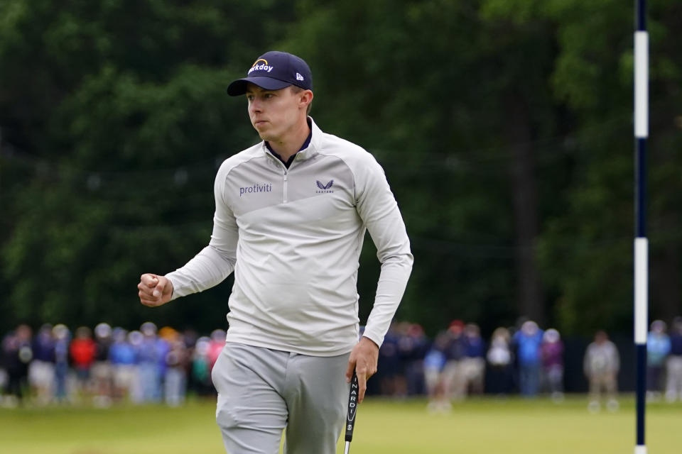 Matthew Fitzpatrick, of England, reacts after a putt on the 15th hole during the final round of the U.S. Open golf tournament at The Country Club, Sunday, June 19, 2022, in Brookline, Mass. (AP Photo/Julio Cortez)