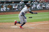 Cleveland Indians' Tyler Naquin hits an RBI-double during the 12th inning of a baseball game against the St. Louis Cardinals in St. Louis, Saturday, Aug. 29, 2020. (AP Photo/Scott Kane)