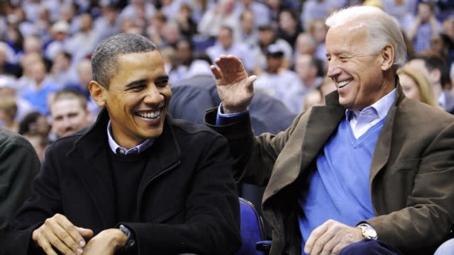 Former President Barack Obama with President Joe Biden during an NCAA college basketball game in 2010.