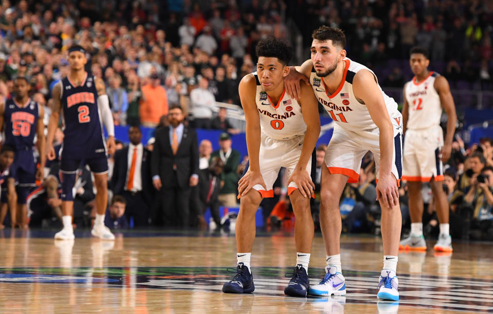 MINNEAPOLIS, MINNESOTA - APRIL 06: Kihei Clark #0 of the Virginia Cavaliers and Ty Jerome #11 of the Virginia Cavaliers watch a free throw late in the semifinal game in the NCAA Men's Final Four at U.S. Bank Stadium on April 06, 2019 in Minneapolis, Minnesota. (Photo by Jamie Schwaberow/NCAA Photos via Getty Images)