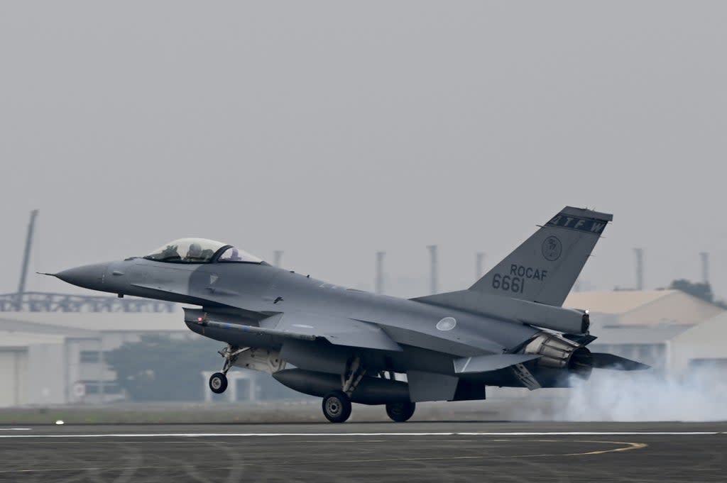 File photo: An armed US-made F-16V fighter lands on the runway at an air force base in Chiayi, southern Taiwan, 5 January 2022 (AFP via Getty Images)