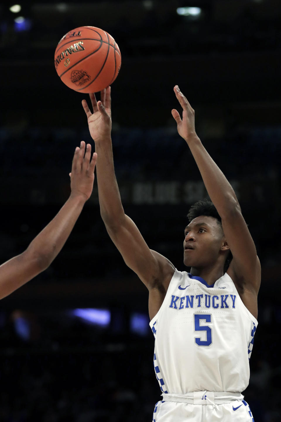 Kentucky guard Immanuel Quickley (5) shoots against Michigan State during the second half of an NCAA college basketball game Tuesday, Nov. 5, 2019, in New York. Kentucky won 69-62. (AP Photo/Adam Hunger)