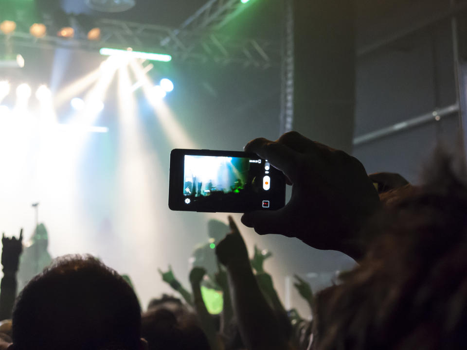 Phone held up during a concert