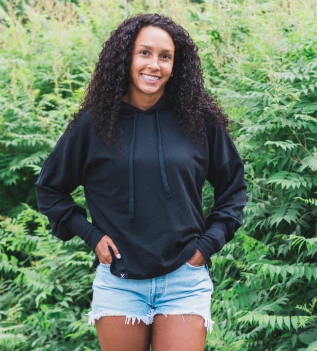 Classic Hoodie in Black ft. "be here now". Image via Pure Balxnced.