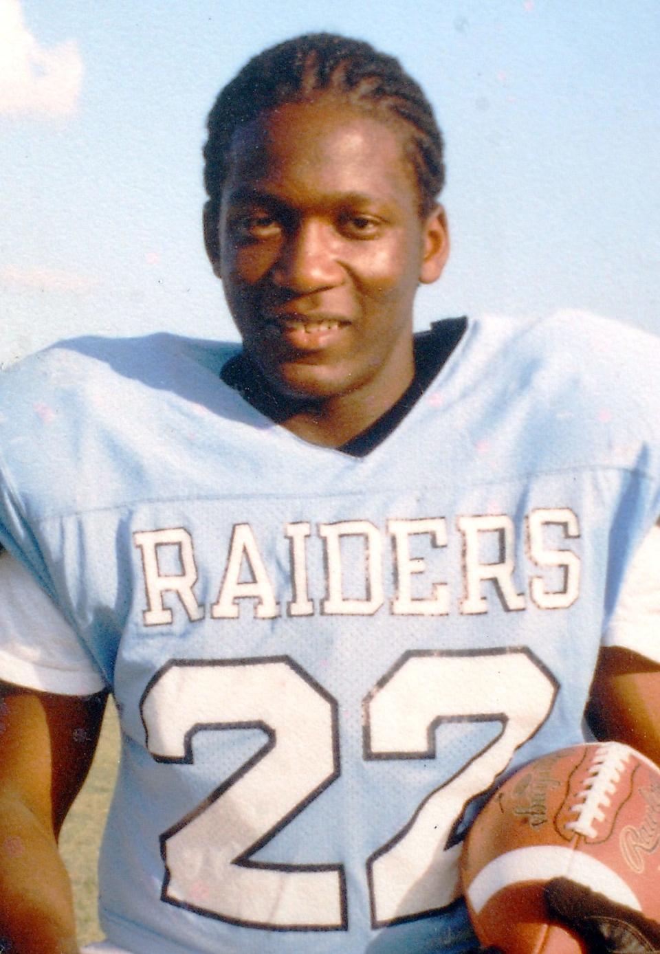 FILE PHOTO
Marcus McTear in his uniform with Reagan High 's football team, 2001-2002 year......