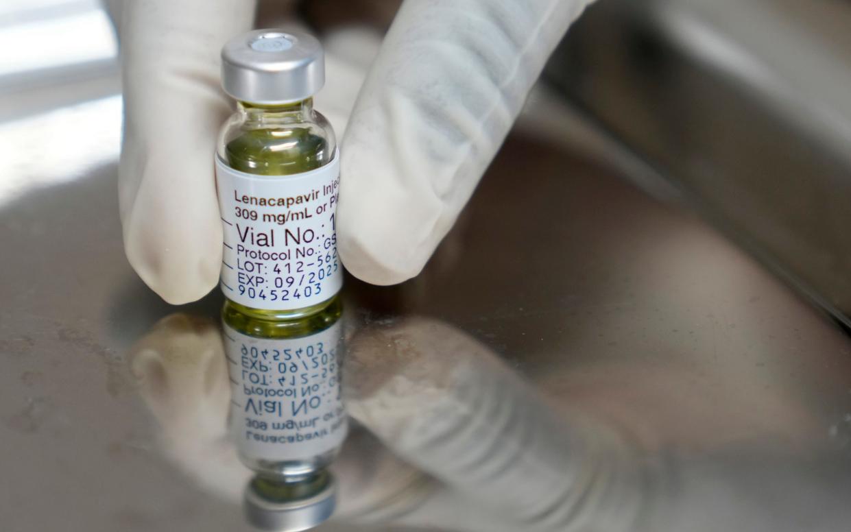 A pharmacist holds a vial of lenacapavir, the new HIV prevention injectable drug, at the Desmond Tutu Health Foundation's Masiphumelele Research Site, in Cape Town, South Africa