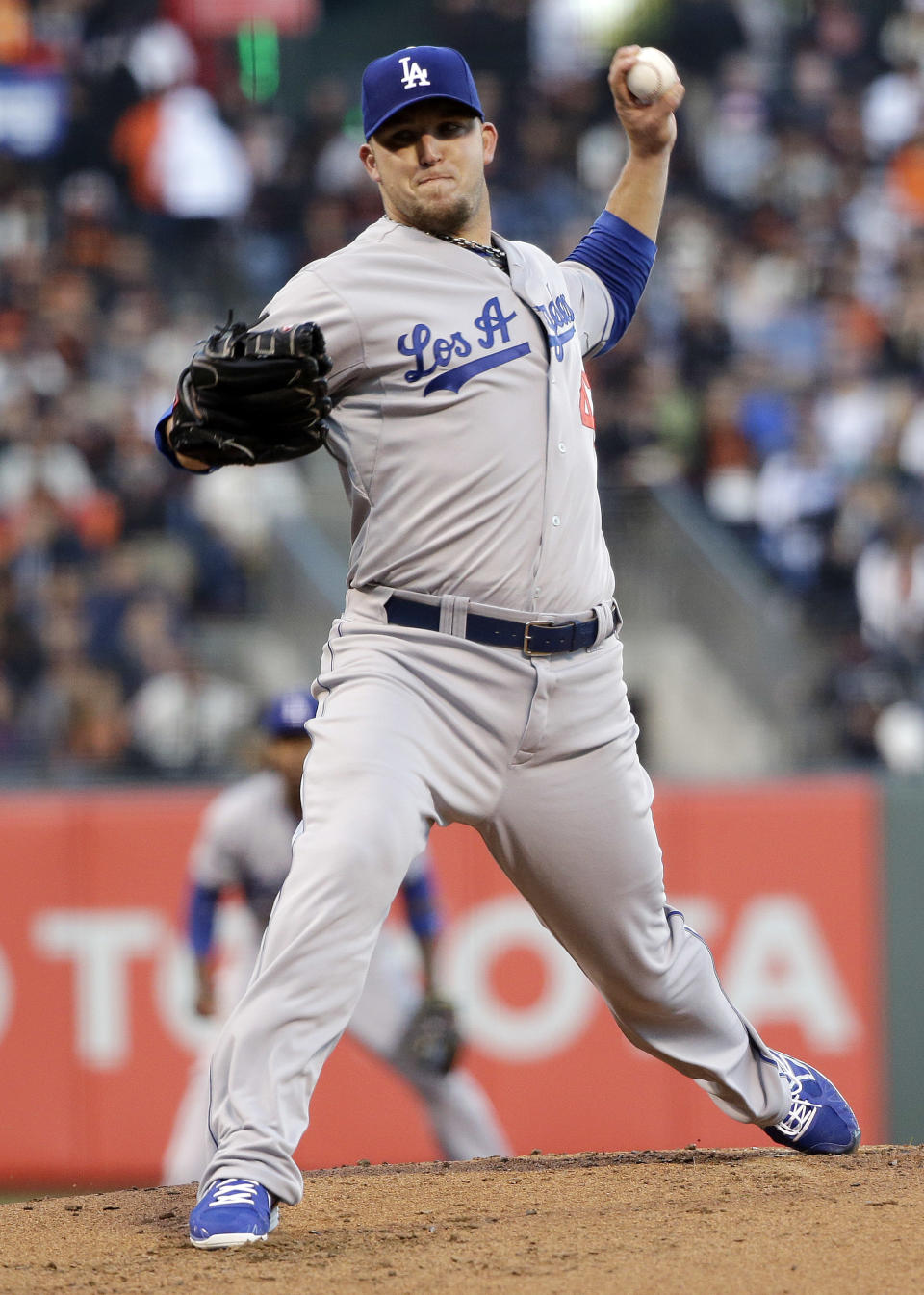Los Angeles Dodgers starter Paul Maholm throws to the San Francisco Giants during the first inning of a baseball game Wednesday, April 16, 2014, in San Francisco. (AP Photo/Marcio Jose Sanchez)