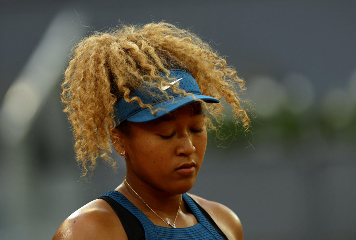 Tennis - WTA Masters 1000 - Madrid Open - Caja Magica, Madrid, Spain - May 1, 2022 Japan's Naomi Osaka reacts during her second round match against Spain's Sara Sorribes Tormo REUTERS/Susana Vera