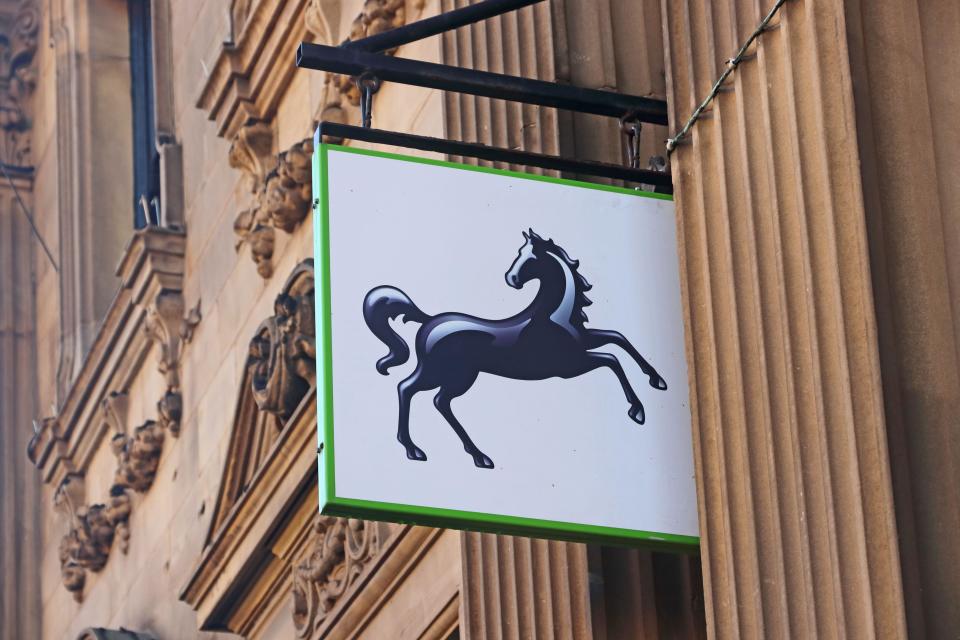 Black horse sign over branch of Lloyds Bank