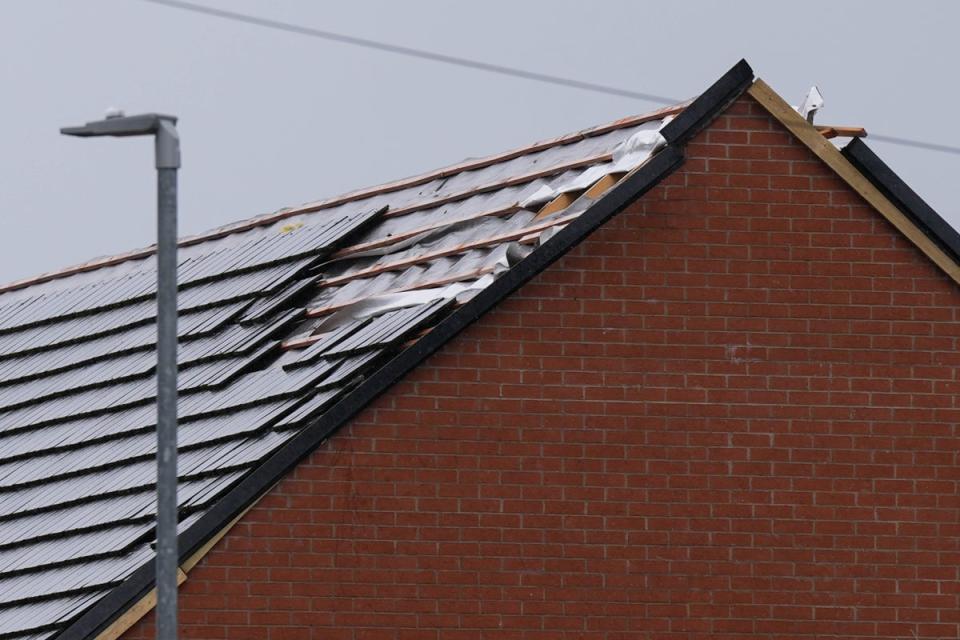 Missing tiles from a roof on St Gile’s Road in Knutton, Staffordshire, where high winds caused damage in the early hours of the morning (PA)