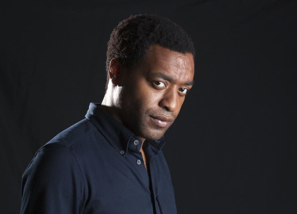 This Sept. 14, 2013 photo shows British actor Chiwetel Ejiofor from the film "12 Years A Slave," in New York. Ejiofor portrays Solomon Northup, a free black man who was abducted and sold into slavery in this pre-Civil War drama. (Photo by Carlo Allegri/Invision/AP)