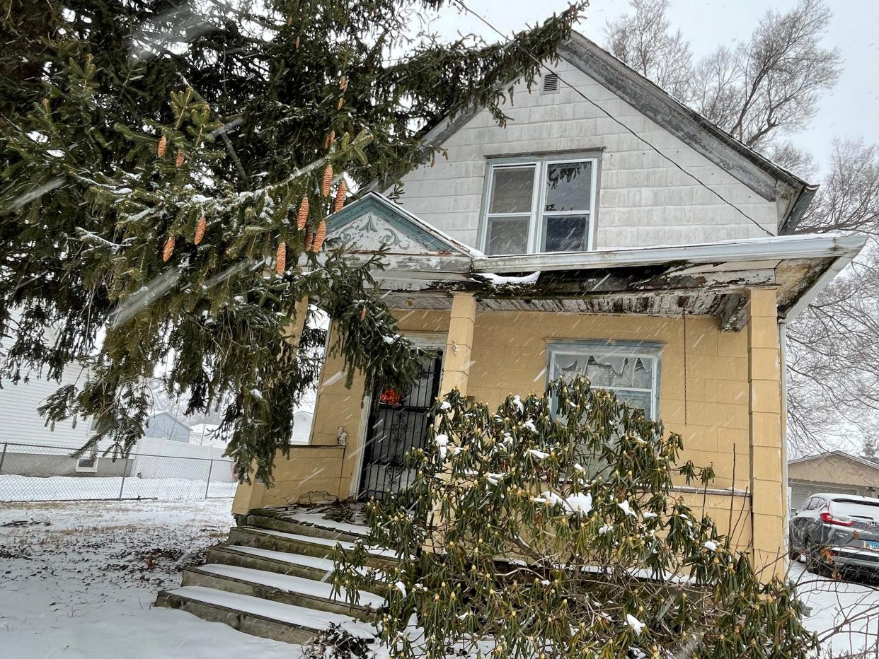 Neighbors of 946 S. Pearl St. noted that the abandoned house attracts animals. A city report lists that the roof is decaying and the garage has an opening allowing the possible entry of rodents.