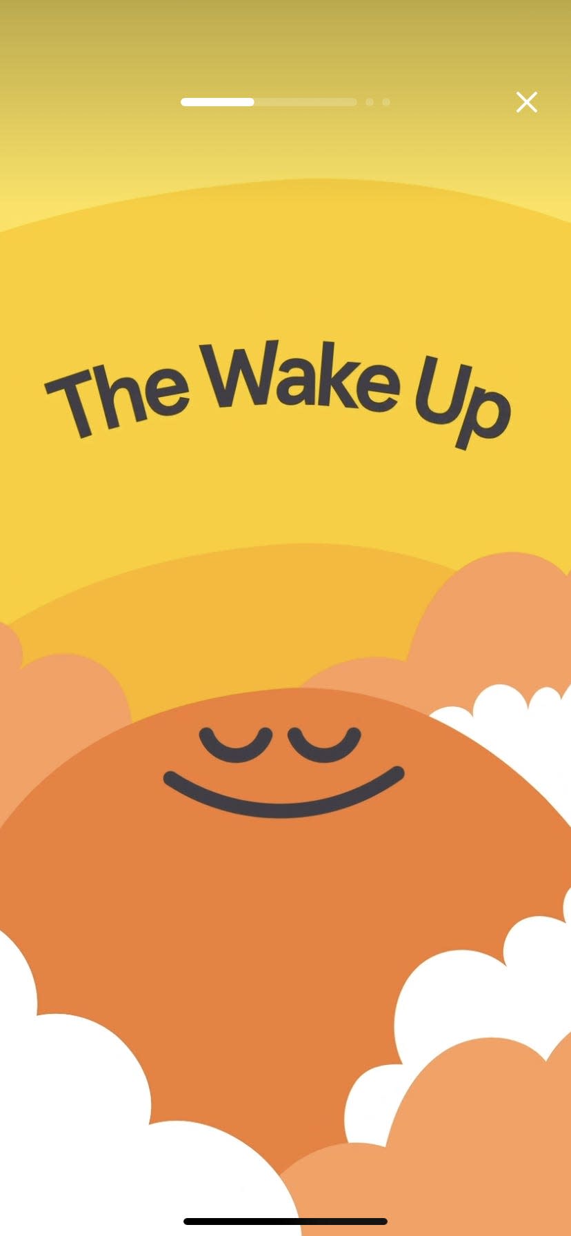 an animated orange sky and clouds with the text "The Wake Up" in a screenshot of the meditation app Headspace