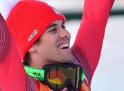 Switzerland's Sandro Viletta reacts after winning the Alpine skiing super sombined slalom during the Sochi Winter Olympics on February 14, 2014