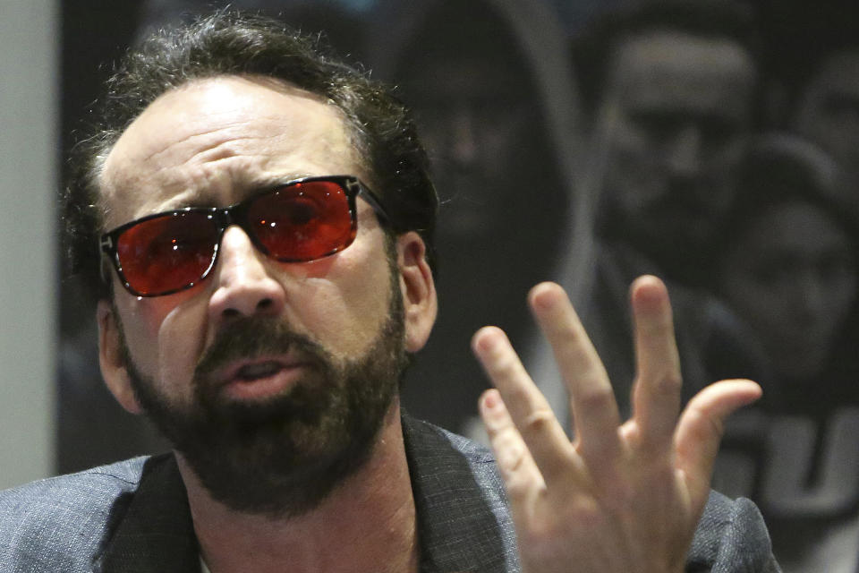 Academy award winning actor Nicolas Cage speaks at a news conference for his new film Jiu Jitsu being filmed on the eastern Mediterranean island nation of Cyprus, in the Cypriot capital Nicosia on Saturday, June 29, 2019. Cage said the film which is a fusion of the action and science fiction genres which he has admired and grew up with drew him to the project. He said Cyprus had a &quot;good spirit&quot; for him which he said informs his performance. (AP Photo/Petros Karadjias)